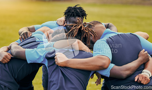 Image of Diversity, team and men huddle in sports for support, motivation or goals outdoors. Man sport group and rugby scrum together for fitness, teamwork or success in collaboration before match or game