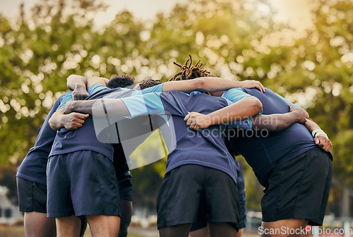 Image of Diversity, team and men huddle in sports for support, motivation or goals outdoors. Man sport group and rugby scrum together for fitness, teamwork or success in collaboration before match or game