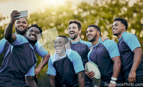 Image of Rugby, team and sports selfie for profile picture, vlog or social media post together. Sporty man holding smartphone smiling in teamwork for group photo, memory or friendship outdoors