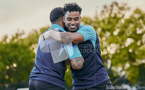 Image of Man, friends and hug in sports for partnership, teamwork or trust in unity for game or match in nature. Happy men hugging in sport practice, rugby or workout exercise in team training outdoors