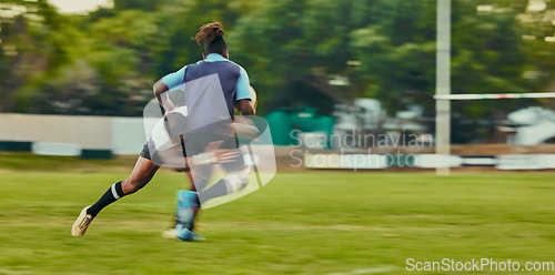 Image of Rugby, tackle and action, black man running to score goal on field at game, match or practice workout. Sports, fitness and motion, player in action and blur on grass with energy and skill in sport.