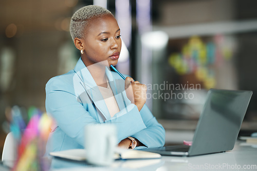 Image of Laptop, idea and a serious business black woman in her office on a review, proposal or project. Work, focus and thinking with a female employee reading an email or doing research while working