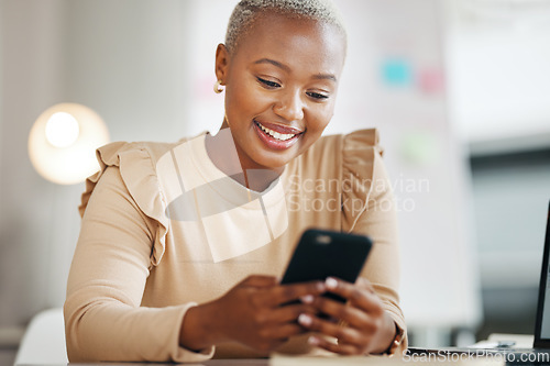Image of Black woman, office and texting for communication with phone, email or social media with happiness. Businesswoman, smartphone and chat for online dating, blog post and smile for contact at desktop