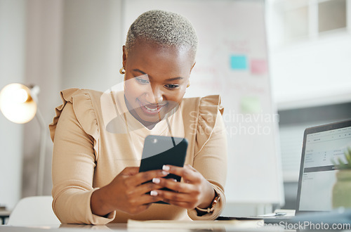 Image of Black woman, office and texting on smartphone with smile, email or social media with happiness. Businesswoman, phone app and web chat for online dating, blog post and excited for contact at desktop