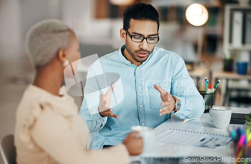 Image of Team, interracial and discussion, brainstorming and meeting about project and communication, strategy and diversity. Collaboration at digital marketing agency, planning and people at desk with folder