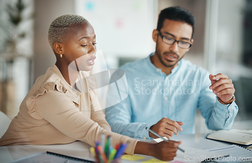 Image of Teamwork, interracial and planning, brainstorming and meeting, market research and communication, strategy and discussion. Collaboration at digital marketing startup with people at desk writing notes