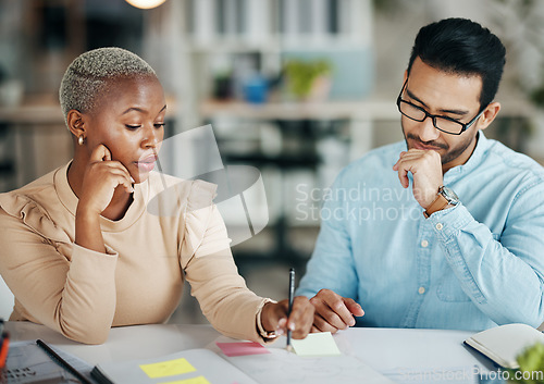 Image of Team, interracial and planning, brainstorming and meeting, market research and communication, strategy and diversity. Collaboration at digital marketing agency, people talk at desk with sticky note