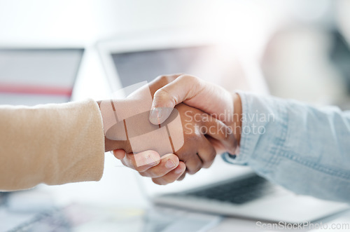 Image of Business people, handshake and meeting for b2b, partnership or deal in teamwork collaboration at office. Employees shaking hands for team strategy, promotion or greeting introduction at the workplace