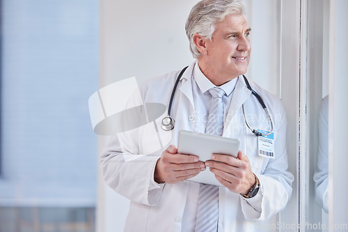 Image of Thinking, man and doctor with tablet, healthcare or idea for solution, diagnosis or planning. Mature male, medical professional or worker with device, wonder or online research for wellness or window