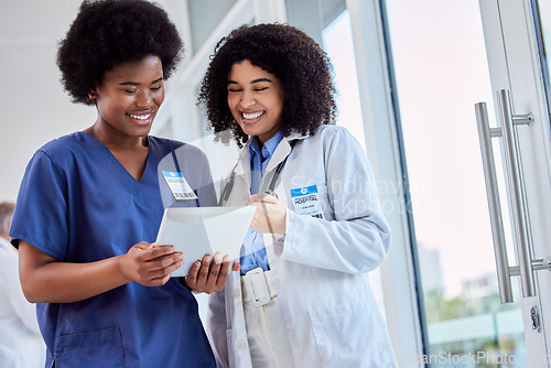 Image of Tablet, medical or teamwork with a doctor and nurse talking in the hospital while doing research. Healthcare, collaboration and trust with professional colleagues in medicine working in a clinic