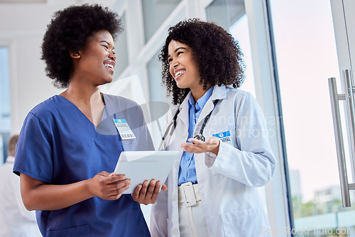 Image of Tablet, healthcare or teamwork with a doctor and nurse talking in the hospital while doing research. Medical, collaboration and trust with professional colleagues in medicine working in a clinic