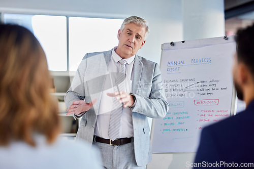 Image of Senior businessman, presentation and meeting for staff training, coaching or planning by whiteboard at the office. Corporate CEO man presenter in team strategy or teaching employees in group seminar