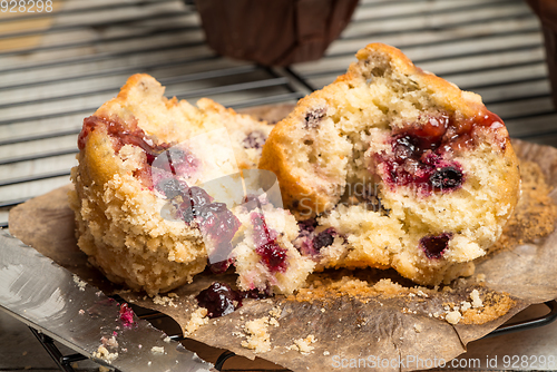 Image of Muffins with red fruits jam fill.