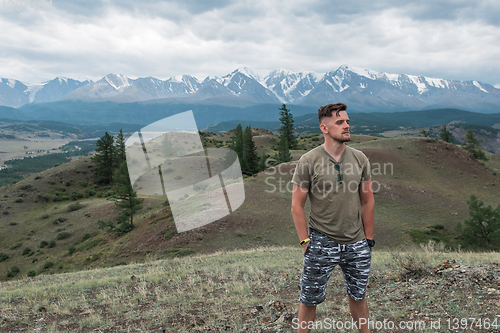 Image of Relaxing man in Kurai steppe on North-Chui ridge