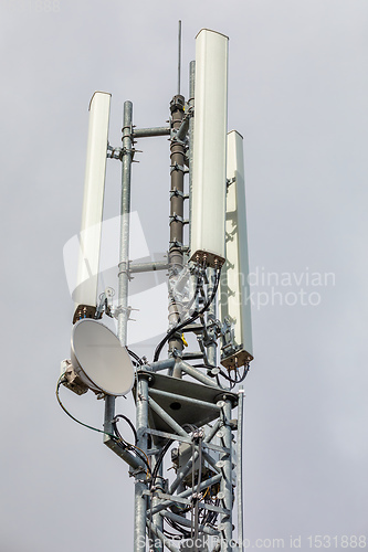 Image of Wireless communication tower with antenna
