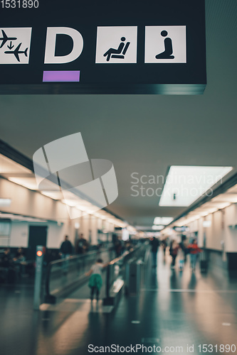 Image of Peoples walking in Vienna airport terminal