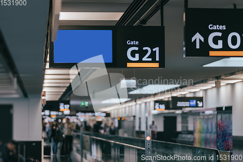 Image of Peoples walking in Vienna airport terminal