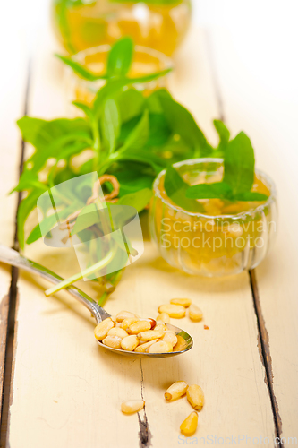 Image of Arab traditional mint and pine nuts tea