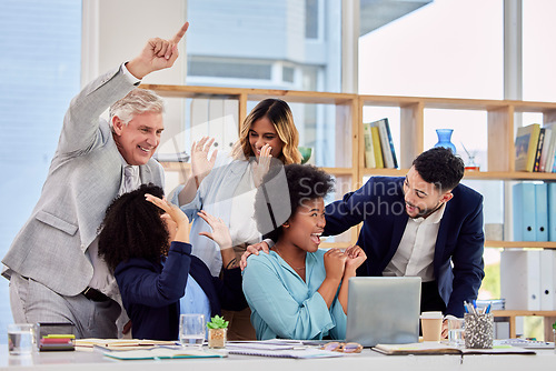 Image of Business people, celebration and meeting in congratulations for promotion, sale or bonus at office desk. Group of employees celebrating corporate success, teamwork or support for winning achievement