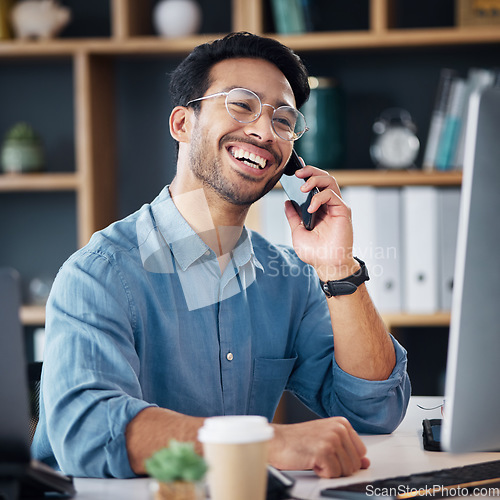 Image of Business man, phone call and laughing at computer, office desk or conversation with smile. Happy worker, cellphone and communication for management, mobile networking or smartphone contact technology