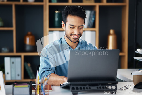 Image of Happy business man typing on laptop in office for startup management, planning and agency. Male worker, smile and computer technology for online project, website and internet research for innovation