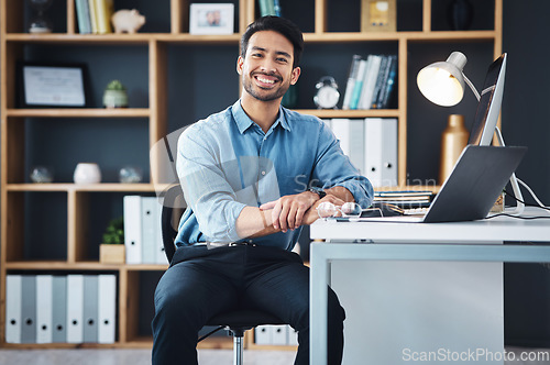 Image of Relax, manager and portrait of startup founder smile and sitting in company office excited for the future. Young, happy and professional business man, employee or worker feeling confident and proud