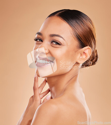 Image of Happy, skincare portrait or girl model with beauty in studio smiling young face on beige background. Dermatology self love, natural smile or beautiful woman with facial treatment or glowing results