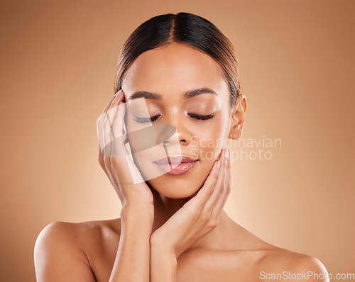 Image of Wellness, natural beauty and woman with soft skin from facial and dermatology. Self care, skincare and studio background with a young model feeling face texture after spa and cosmetics treatment