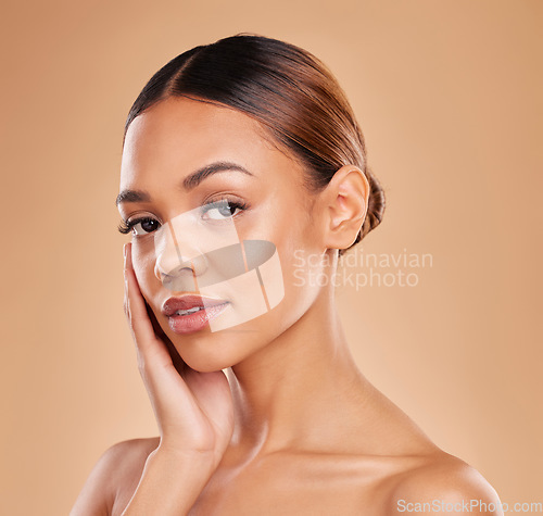 Image of Skincare, portrait or girl model with beauty in studio with youth or young face on beige background. Dermatology self love, natural makeup or beautiful woman with facial treatment or glowing results