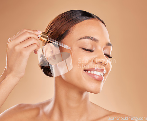 Image of Beauty serum, oil or happy woman in studio on beige background in a facial skincare in grooming spa. Face smile, eyes closed or natural girl with essential oils or glowing luxury self care products