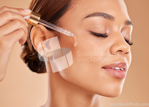 Image of Beauty serum, oil or girl model in studio on beige background in facial skincare in grooming spa. Face, eyes closed or natural woman with essential oils or glowing luxury self care hydration products