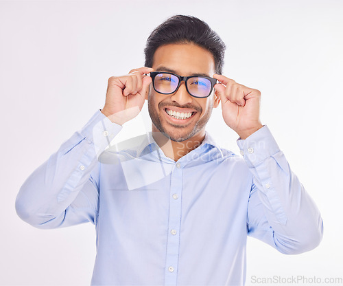 Image of Portrait, vision and glasses with a man in studio on a white background to promote eye care optometry. Face, eyewear or eyesight with a handsome young male wearing new prescription frame spectacles