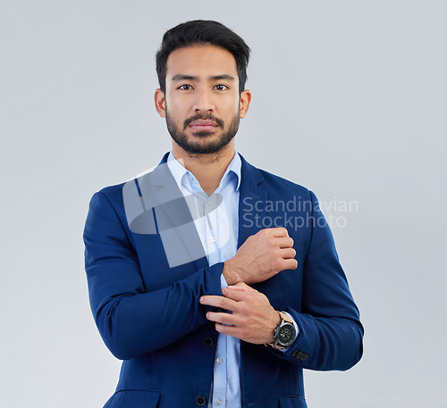 Image of Business man, serious and style portrait in studio for corporate or CEO fashion. Face of asian entrepreneur person on isolated white background with pride for luxury, success and wealth motivation