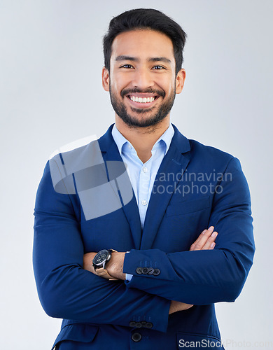 Image of Business man, smile and arms crossed portrait in studio for corporate or CEO fashion while happy. Face of asian entrepreneur person isolated white background with pride for luxury, success and wealth