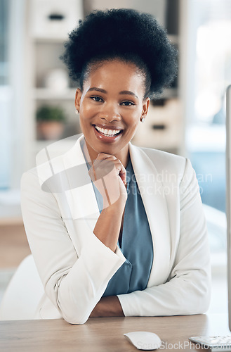 Image of Happy, success and portrait of a black woman in the office with a computer working or doing research. Business, smile and African female corporate manager sitting at her desk with a pc in workplace.
