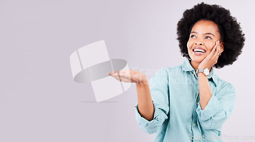 Image of Mockup, product placement and black woman with hands in studio for advertising, marketing and branding. Happy, smile and isolated girl with gesture on white background for show, choice and promotion