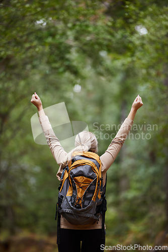 Image of Back, woman hiker and and arms of freedom, success and hope of courage, power or mockup. Hiking, travel and celebration of motivation, inspiration and goals of wellness, energy or adventure in nature