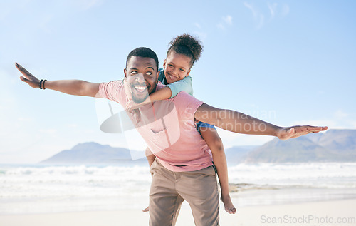 Image of Beach, black man flying and playing with child on playful family holiday in Australia with freedom and energy. Travel, fun and happy dad with girl, smile and happiness, bonding together on vacation.