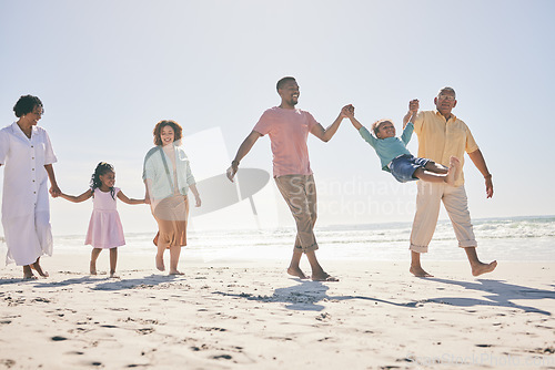 Image of Family walk beach, freedom and travel, generations and happy people, grandparents with parents and kids. Adventure, outdoor with dad and grandfather swing kid, fun on holiday with hand holding