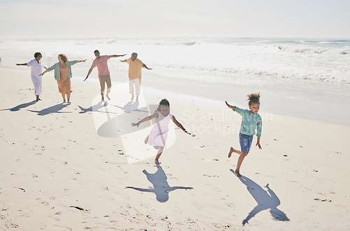 Image of Family have fun on beach, freedom and travel, generations and happy people outdoor, grandparents with parents and kids. Adventure, carefree and excited, running and playful with happiness on vacation