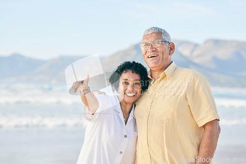 Image of Old couple at beach, hug and travel with smile, retirement and love outdoor, vacation with view and relax in nature. Peace, zen and man with woman pointing, happiness and wellness in Bali on holiday