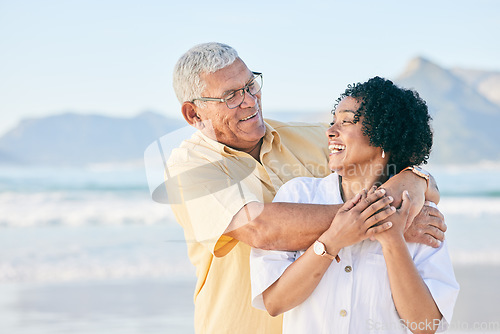 Image of Senior couple at beach, hug and happy with travel, retirement and love outdoor, vacation with view and relax in nature. Peace, zen and tropical island, man and woman with marriage and happiness