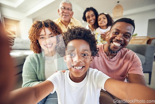 Image of Care, smile and selfie with black family in living room for social media, bonding and relax. Happiness, picture and generations with parents and children at home for memory, support and weekend