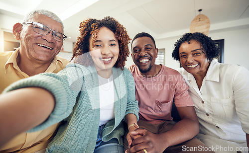 Image of Happy, smile and selfie with black family in living room for social media, bonding and relax. Happiness, picture and generations with couple and elderly parents at home for memory, support or weekend