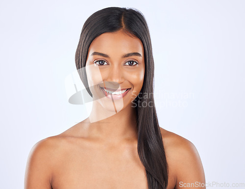 Image of Woman, hair and beauty and haircare in portrait with smile, cosmetic care and keratin treatment on studio background. Happy, Indian female with hairstyle and skin glow, Brazilian and cosmetics