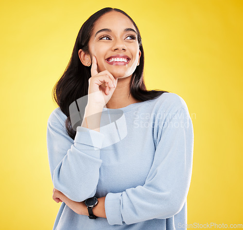 Image of Yellow background, thinking and face of woman with smile for advertising, promotion and mockup space. Ideas, thoughtful and isolated girl in studio with happy mindset, positive attitude and confident