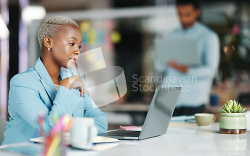 Image of Thinking, office laptop focus and black woman, creative agent or serious person work on brand advertising plan. Project, problem solving and girl reading company report idea for social media strategy