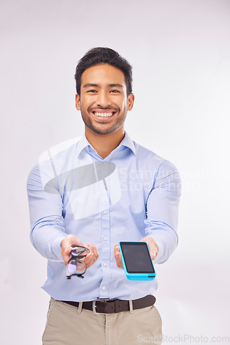 Image of Glasses, payment machine and portrait of a man holding frame design with a smile. Retail worker, optometrist and eyewear of a model ready for selling and qr code scan in a studio with white backgroun