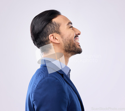 Image of Profile, happy and vision with a business man in studio on a gray background looking to the future with motivation. Side, smile and thinking with a young male employee feeling confident or carefree