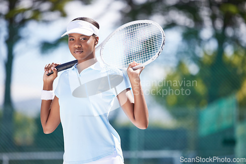 Image of Sports, fitness and tennis with portrait of black woman on court and training for wellness, match and workout. Focus, ready and exercise with athlete playing game for cardio, health and competition